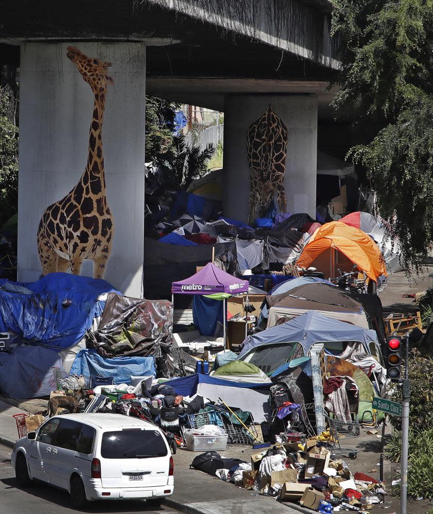 A homeless encampment under a freeway overpass in Oakland, California.