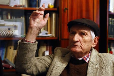 Valentin Cristea, 84, believed to be the only survivor still alive from the communist-era Ramnicu Sarat prison in eastern Romania, gestures during an interview with Reuters in Campina September 23, 2014. REUTERS/Bogdan Cristel