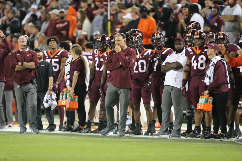 Virginia Tech head coach Justin Fuente watches from the sideline during the first half of an NCAA college football game against Notre Dame in Blacksburg, Va., Saturday, Oct. 9, 2021. (AP Photo/Matt Gentry)