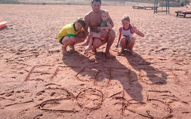 Iurii Shein and pictured with there children at a beach in Egypt. Source: VK/Olga Sheina.