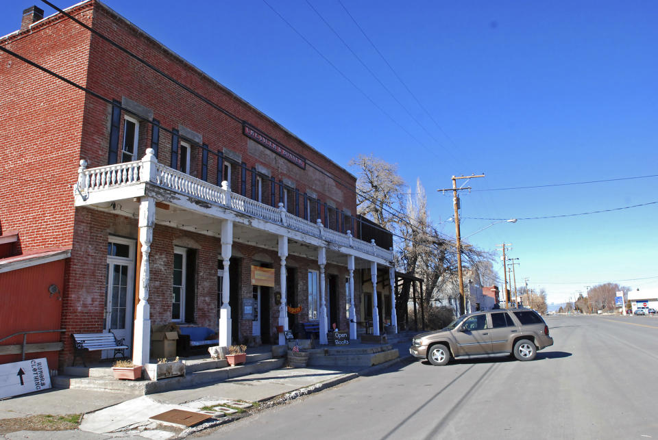 FILE - This Feb. 22, 2014, file photo shows a business in downtown Cedarville, Calif., in Modoc County. The rural California county is defying Gov. Gavin Newsom's coronavirus shutdown order and has become the state's first county to let nonessential businesses reopen. Diners are being allowed into restaurants in Modoc County in the state's northwestern corner near Oregon. Newsom did not say Thursday, April 30, 2020, whether he would intervene in Modoc County as he did in Southern California. (AP Photo/Jeff Barnard, File)