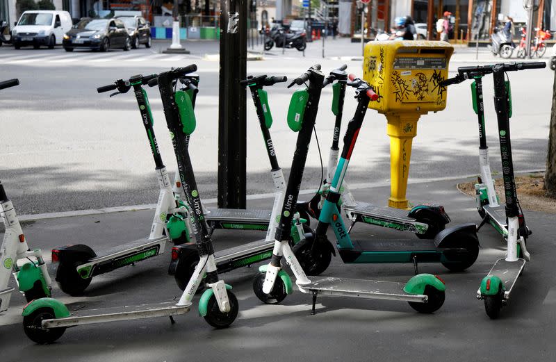 FILE PHOTO: Dock-free electric scooters Lime-S by California-based bicycle sharing service Lime are parked for rent in Paris