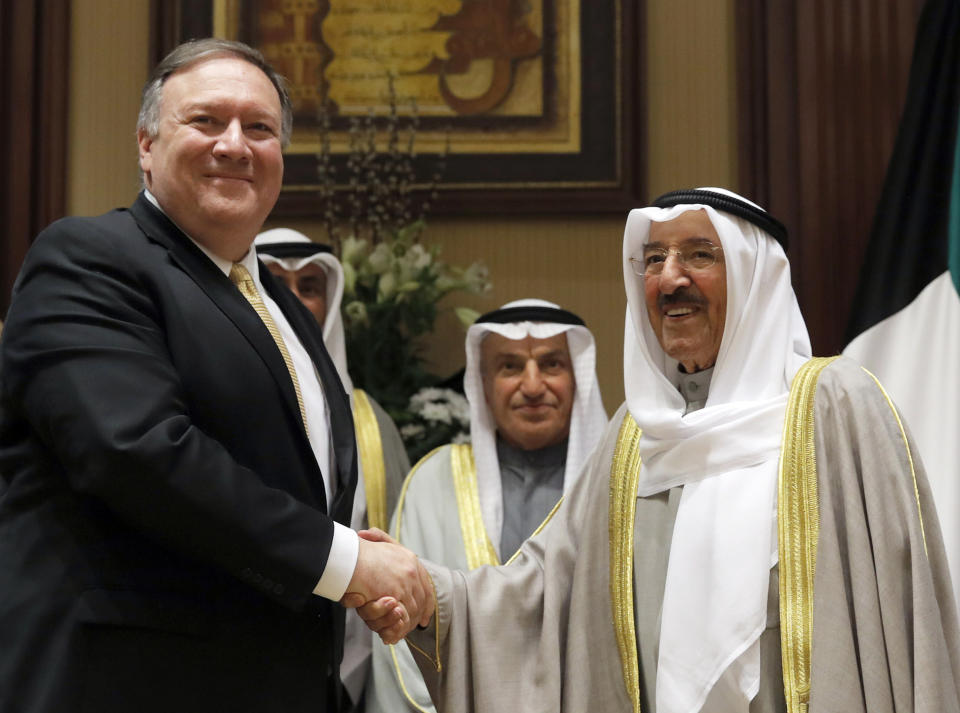 U.S. Secretary of State Mike Pompeo, left, shakes hands with Kuwait's Emir Sheikh Sabah Al-Ahmad Al- Jaber Al-Sabah, in Kuwait City, Kuwait, Wednesday, March 20, 2019. (Jim Young/Pool Photo via AP)