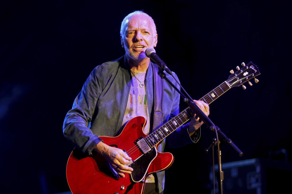 FILE - Peter Frampton performs during "Finale - The Farewell Tour" at Huntington Bank Pavilion on Sunday, July 28, 2019, in Chicago. Frampton is among the 2024 nominees for induction into the Rock & Roll Hall of Fame. (Photo by Rob Grabowski/Invision/AP, File)