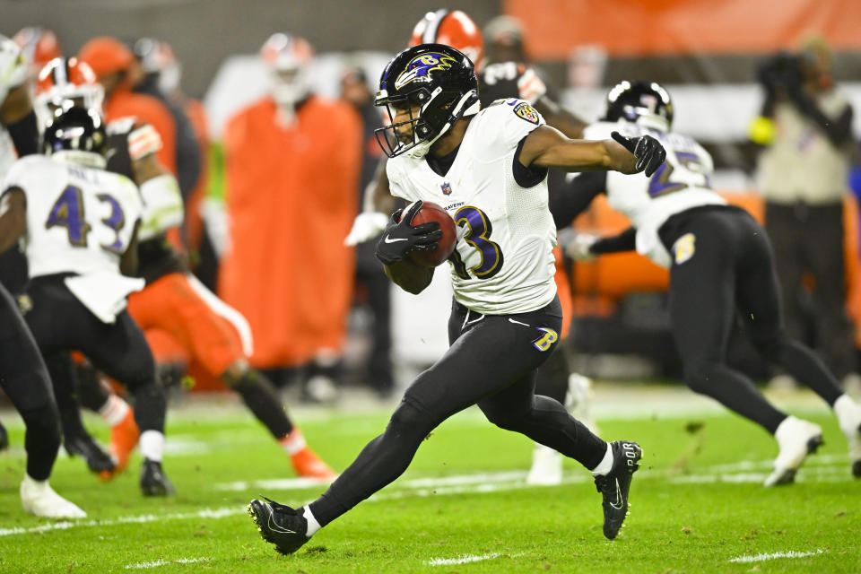 Baltimore Ravens wide receiver Devin Duvernay carries the ball during the first half of an NFL football game against the Cleveland Browns, Saturday, Dec. 17, 2022, in Cleveland. (AP Photo/David Richard)