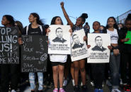 Marchers move west on Burnside towards the Burnside Bridge in Portland, Tuesday evening, June 2, 2020. Protests continued for a sixth night in Portland, demonstrating against the death of George Floyd, a black man who died in police custody on Memorial Day in Minneapolis. (Sean Meagher/The Oregonian via AP)