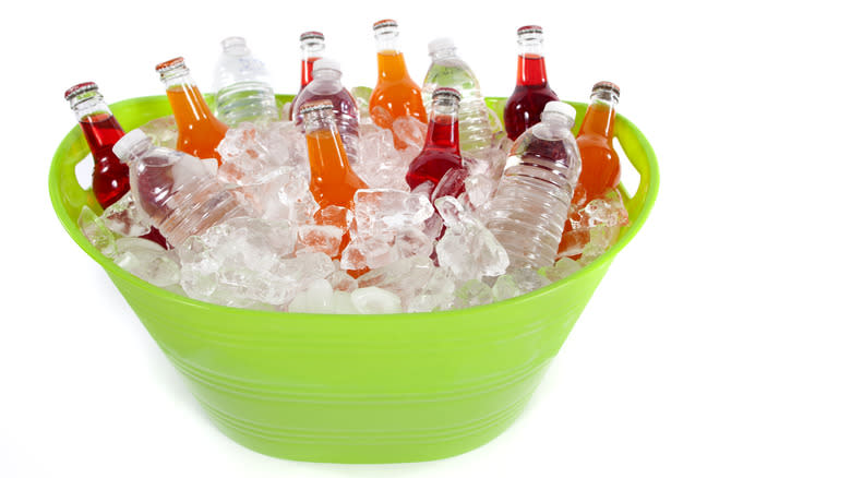 bucket with soda bottles