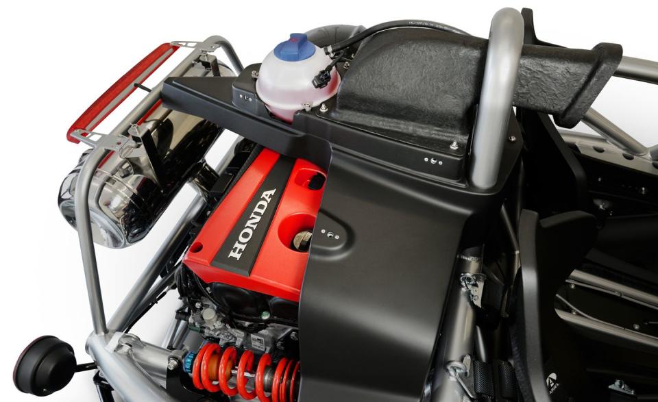 <p>The biggest change sits under the plastic cover at the back of the car: the turbocharged 2.0-liter inline-four, the same engine that powers <a rel="nofollow noopener" href="https://www.caranddriver.com/honda/civic-type-r" target="_blank" data-ylk="slk:the Honda Civic Type R;elm:context_link;itc:0;sec:content-canvas" class="link ">the Honda Civic Type R</a>.</p>