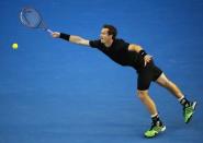 Andy Murray of Britain stretches to hit a return against Nick Kyrgios of Australia during their men's singles quarter-final match at the Australian Open 2015 tennis tournament in Melbourne January 27, 2015. REUTERS/Carlos Barria