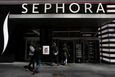 FILE PHOTO: People walk into a Sephora store in Times Square in the Manhattan borough of New York, New York, U.S. April 2, 2017. REUTERS/Carlo Allegri/File Photo