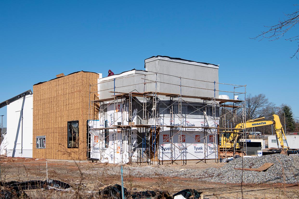 A Popeyes and a Car Max are under construction in the former Toys R Us lot on Brevard Road in Asheville.