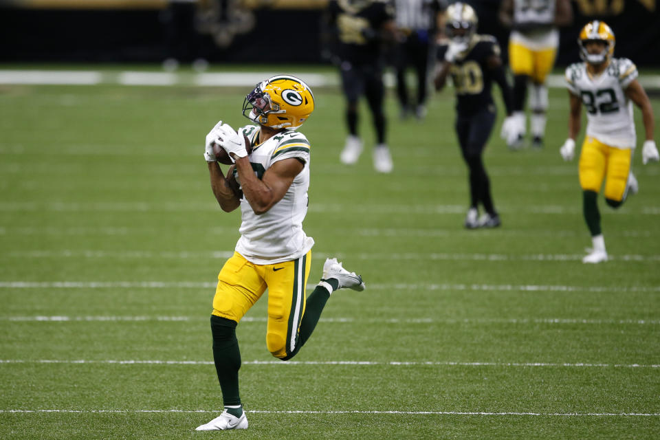 Green Bay Packers wide receiver Allen Lazard (13) pulls in a 72 yard pass completion in the second half of an NFL football game against the New Orleans Saints in New Orleans, Sunday, Sept. 27, 2020. (AP Photo/Butch Dill)