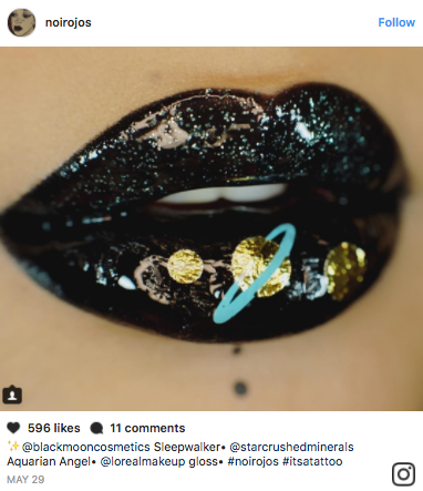 You can wear temporary tattoos as an adult with this fun Instagram eye makeup/ lip art trend. MUAs top the tatts with gloss to elevate the look.