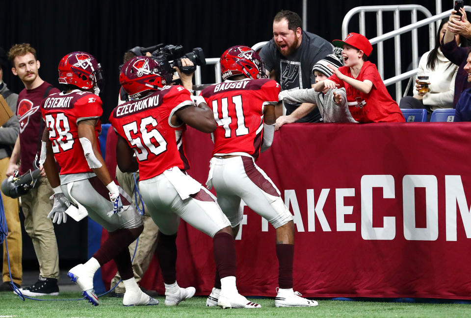 De'Vante Bausby (No. 41) of the San Antonio Commanders celebrates with fans after intercepting a pass during the third quarter against the San Diego Fleet in an Alliance of American Football game on Feb. 9, 2019 in San Antonio, Tex. (Ronald Cortes/AAF/Getty Images)