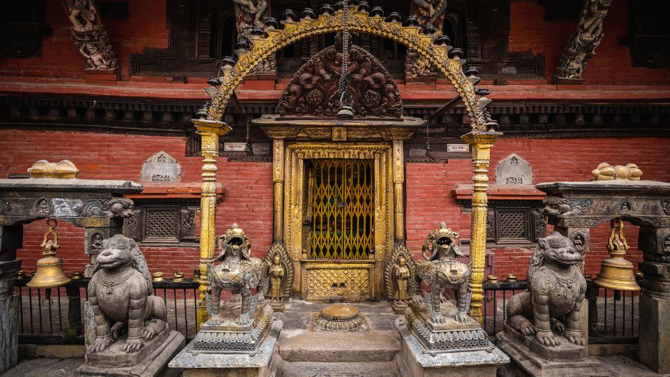 Intricate carvings and bronzes on display outside one of the monastery buildings. - Pranab Joshi/Courtesy Itumbaha