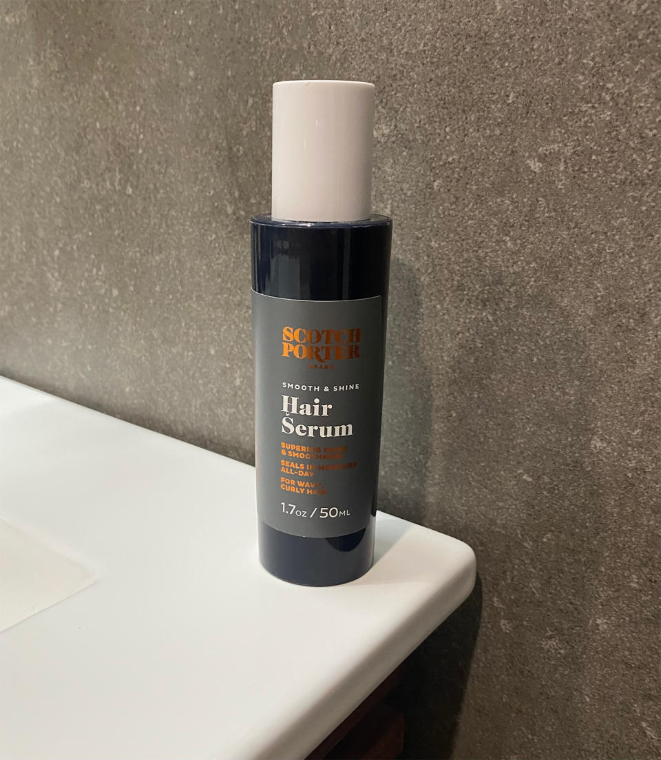 scotch porter hair serum bottle on a bathroom sink