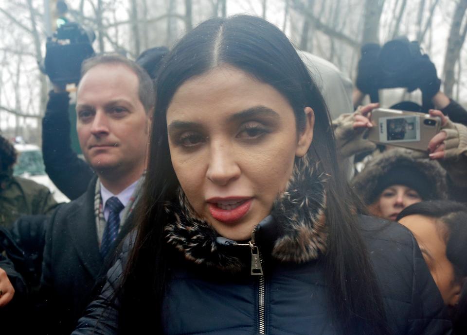 FILE - In this Feb. 12, 2019 file photo, Emma Coronel Aispuro, center, wife of Joaquin "El Chapo" Guzman, leaves federal court in New York.  The wife of Mexican drug kingpin and escape artist Joaquin â€œEl Chapoâ€ Guzman has been arrested on international drug trafficking charges at an airport in Virginia. The Justice Department says 31-year-old Emma Coronel Aispuro, who is a dual citizen of the U.S. and Mexico, was arrested at Dulles International Airport on Monday and is expected to appear in federal court in Washington on Tuesday. (AP Photo/Seth Wenig)
