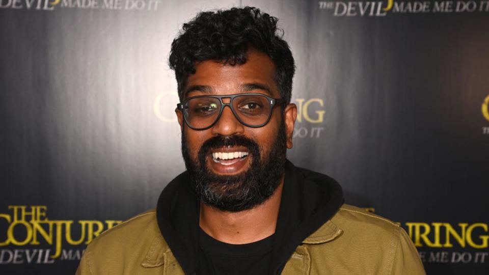 Romesh Ranganathan smiling at a movie screening