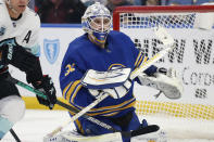 Buffalo Sabres goaltender Dustin Tokarski (31) looks for the puck in traffic during the second period of an NHL hockey game against the Seattle Kraken, Monday, Nov. 29, 2021, in Buffalo, N.Y. (AP Photo/Jeffrey T. Barnes)