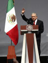 Mexican President Andres Manuel Lopez Obrador greets the crowd at a rally to commemorate his third anniversary in office, in the main square of the capital, the Zocalo, in Mexico City, Wednesday, Dec. 1, 2021. (Photo AP/Marco Ugarte)