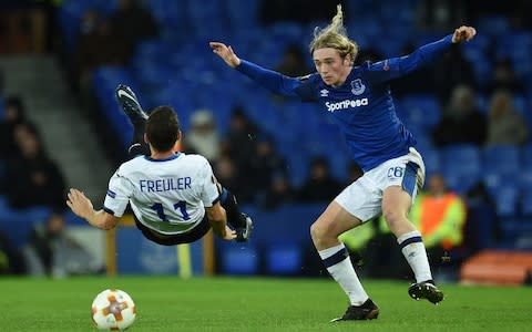 Tom Davies tackles Remo Freuler - Credit: Oli Scarff/AFP