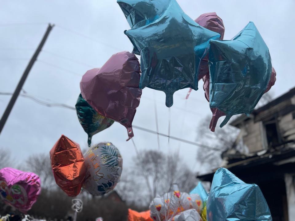 Pink, blue and white balloons released in honor of the six Smith family children who died as a result of a residential fire Jan. 21, 2024, at 222 N. LaPorte Ave. in South Bend.