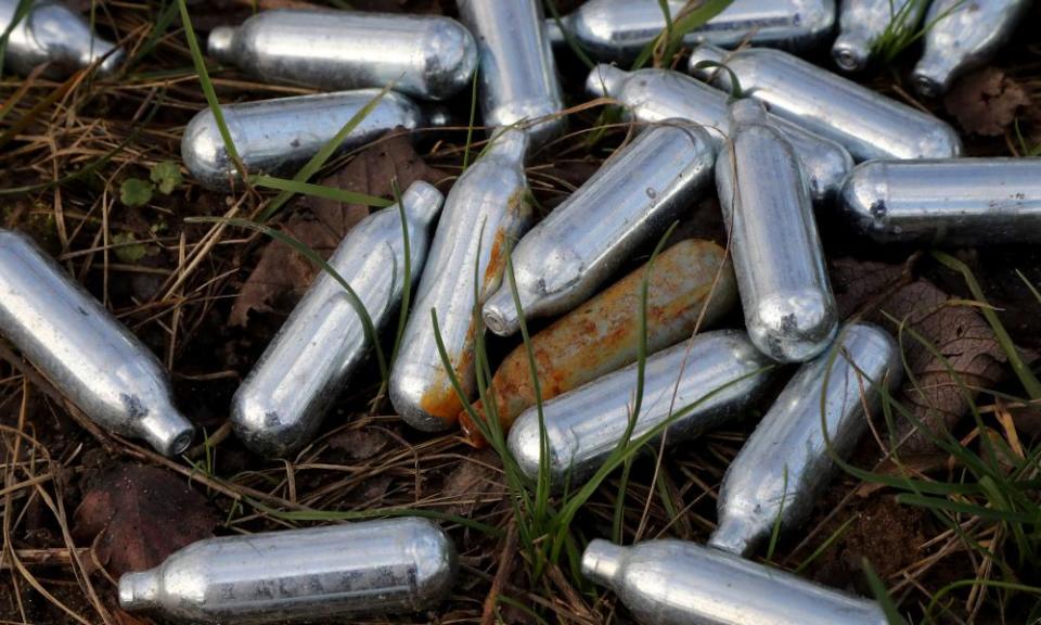 Discarded nitrous oxide gas canisters