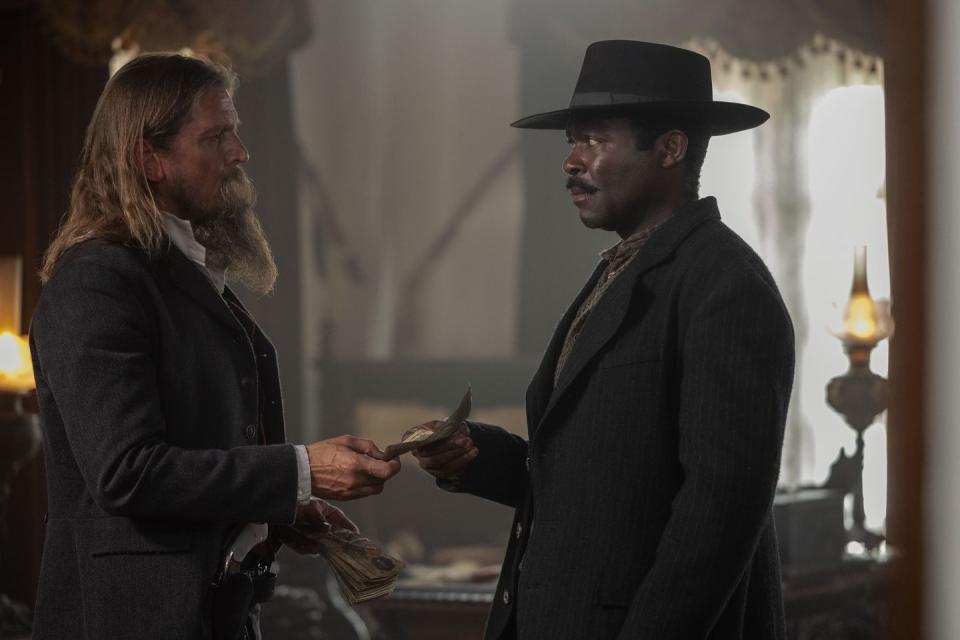 l r barry pepper as esau pierce and david oyelowo as bass reeves in lawmen bass reeves episode 8, season 1 streaming on paramount, 2023 photo credit lauren lo smithparamount