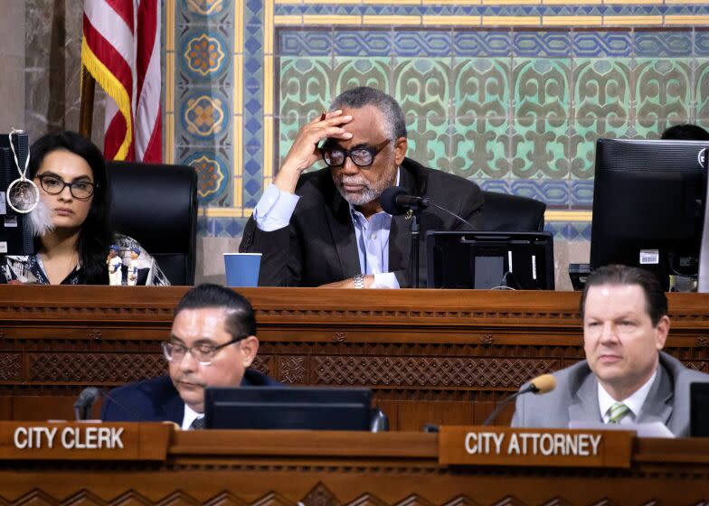 LOS ANGELES, CA - JUNE 13: Los Angeles City Councilmember Curren Price (center), as President pro tempore, presides over the Los Angeles city council meeting at City Hall in Los Angeles, CA on Tuesday, June 13, 2023. He faces criminal charges for a pay to play scheme. (Myung J. Chun / Los Angeles Times)