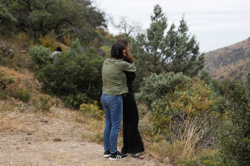 Relatives of the Rhonita Miller-Lebaron and Dawna Ray Langford and their children who were killed by unknown assailants, react after they make a stop at the crime scene during their journey to bury the Miller-Lebaron Family near Bavispe