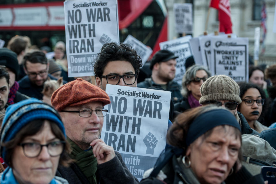 LONDON, ENGLAND - JANUARY 4: Hundreds of people attend the protest outside Downing street against aggression by the USA against Iran on January 4, 2020 in London, England. A protest is called by the Stop The War Coalition outside Downing street to protest against the escalating conflict in the Middle East between America and Iran following the assassination of Qassem Soleimani. (Photo by Guy Smallman/Getty Images)