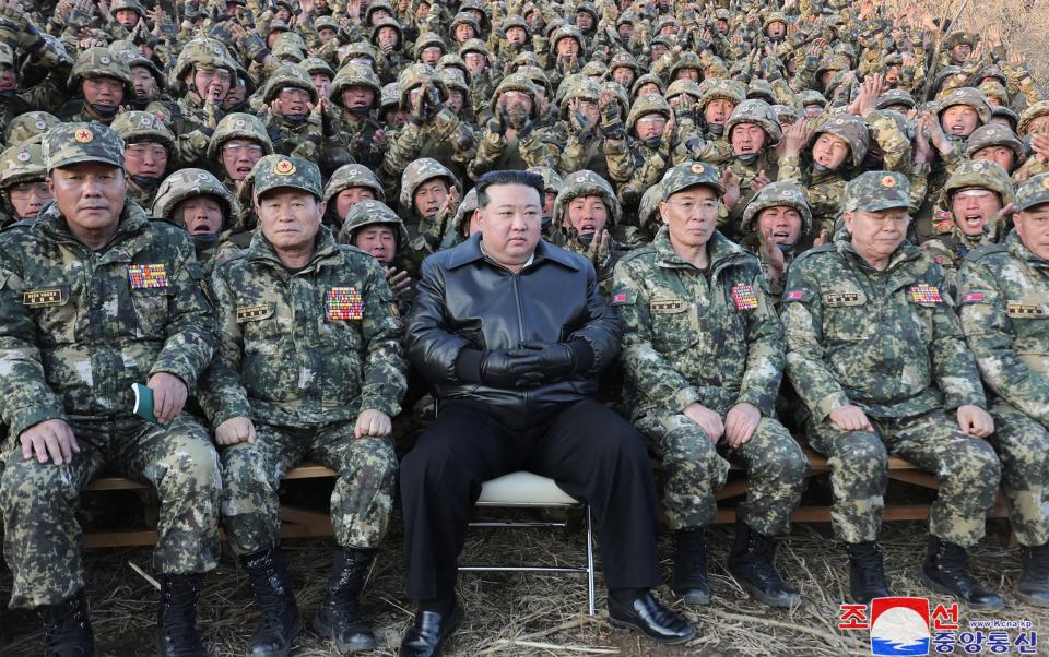 The North Korean leader posed for a photograph with the troops at the unknown base