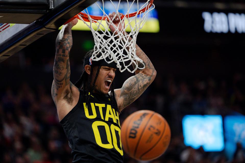 Utah Jazz guard Jordan Clarkson (00) dunks during a game with the Dallas Mavericks at the Delta Center on Jan. 1, 2024.