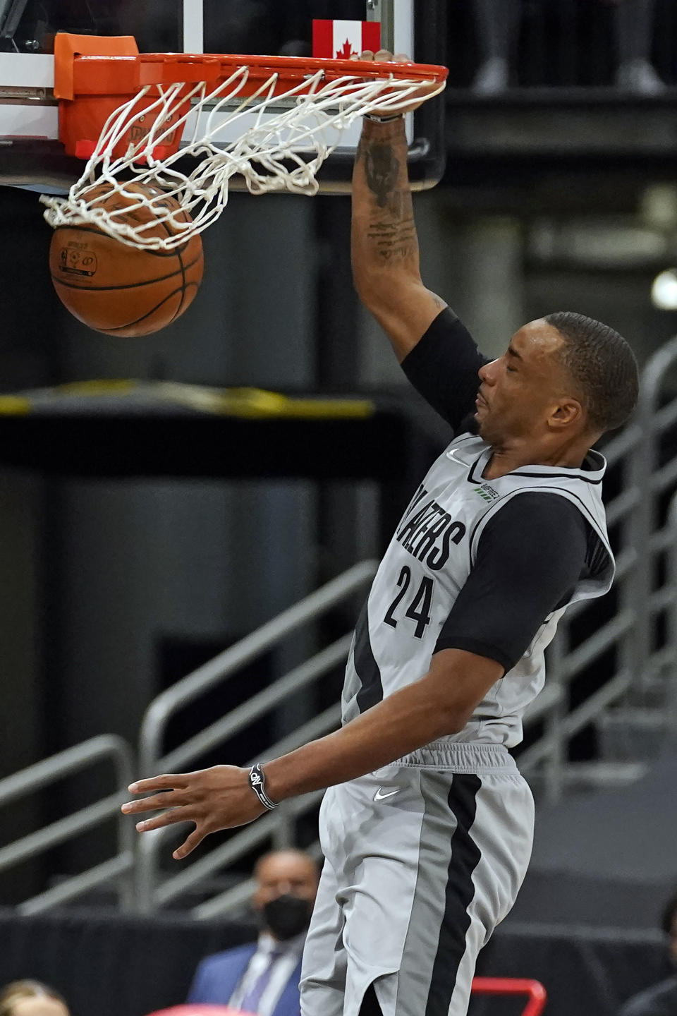 Portland Trail Blazers forward Norman Powell (24) slam dunks the basketball during the second half of an NBA basketball game against the Toronto Raptors Sunday, March 28, 2021, in Tampa, Fla. (AP Photo/Chris O'Meara)