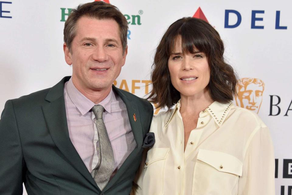 <p>Gregg DeGuire/FilmMagic</p> Michael Goorjian and Neve Campbell attend the 2024 BAFTA Tea Party on Jan. 13, 2023, in Beverly Hills, California