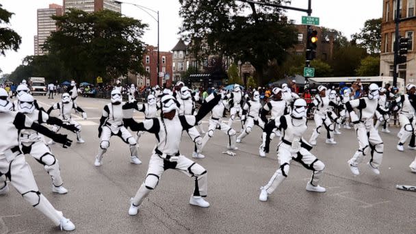 PHOTO: People dressed as Star Wars’ stormtroopers dance during the 87th 'Bud Billiken Parade' on Martin Luther King Drive in Chicago, on Aug. 13, 2016.   (Bilgin S. Sasmaz/Anadolu Agency via Getty Images)