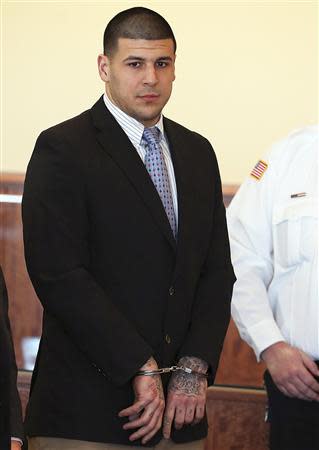 Aaron Hernandez appears for a pre-trial hearing at Bristol County Superior Court in Fall River, Massachusetts February 7, 2014. REUTERS/Jonathan Wiggs/Boston Globe/Pool