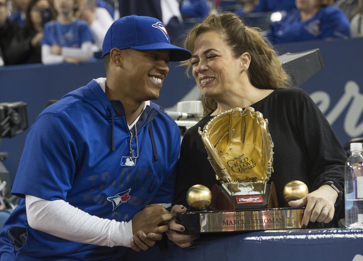 Adlin Auffant, mother of Toronto Blue Jays pitcher Marcus Stroman, throws  out the ceremonial first pitch prior to a baseball game against the Chicago  White Sox in Toronto, Sunday, May 12, 2019. (