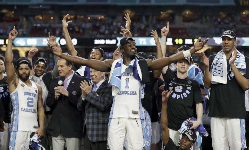 <p>North Carolina’s Theo Pinson (1) and the rest of the team celebrate after the finals of the Final Four NCAA college basketball tournament against Gonzaga, Monday, April 3, 2017, in Glendale, Ariz. North Carolina won 71-65. (AP Photo/David J. Phillip) </p>