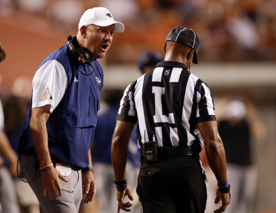 Head coach Jeff Traylor of the UTSA Roadrunners reacts with a referee in the first half against the Texas Longhorns at Darrell K Royal-Texas Memorial Stadium on September 17, 2022 in Austin, Texas. Tim Warner/Getty Images