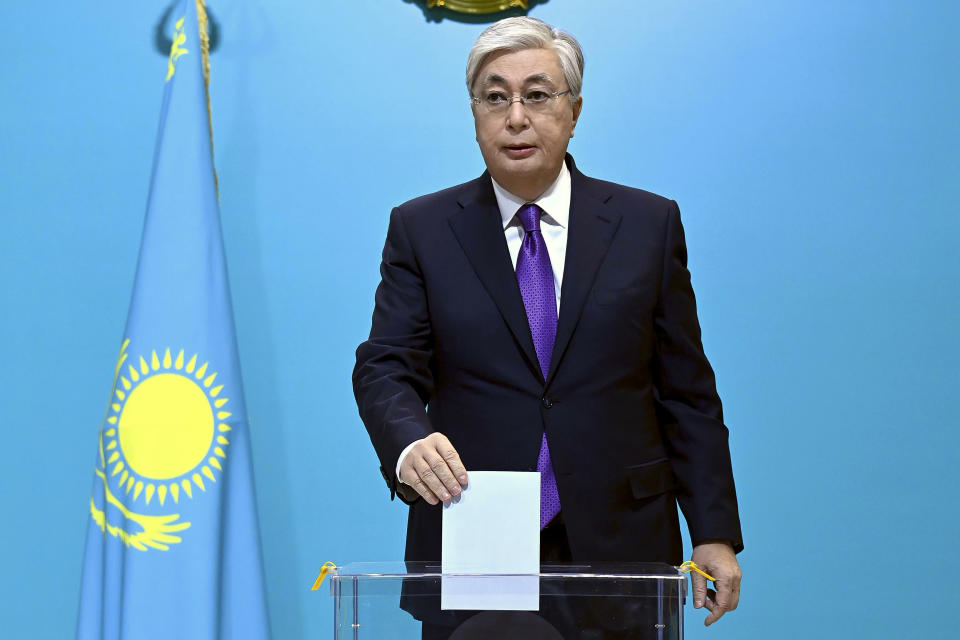 In this handout photo released by Kazakhstan's President Press Office, Kazakhstan's President Kassym-Jomart Tokayev casts his ballot at a polling station in Astasna, Kazakhstan, Sunday, Nov. 20, 2022. Tokayev appears certain to win a new term against little-known challengers in a snap election on Sunday. Five candidates are on the ballot against President Kassym-Jomart Tokayev, who faced a bloody outburst of unrest early this year and then moved to marginalize some of the Central Asian country's longtime powerful figures. (Kazakhstan's President Press Office via AP)