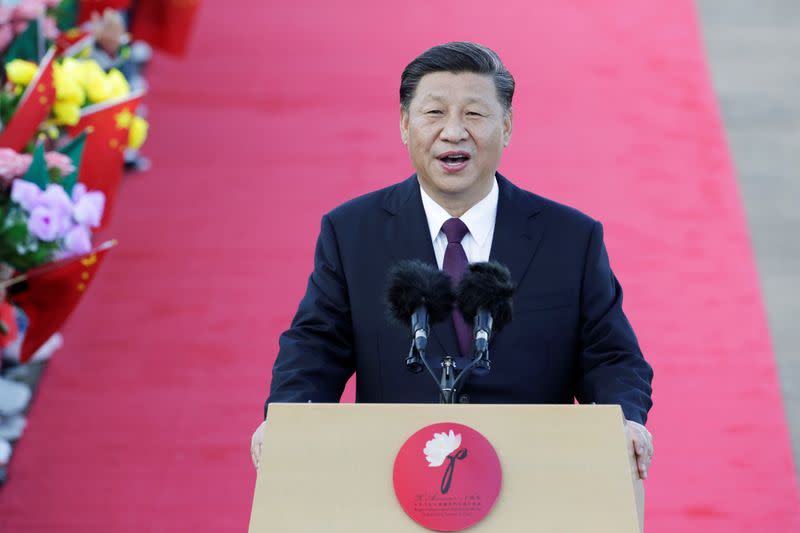 Chinese President Xi Jinping speaks following his arrival at Macau International Airport in Macau