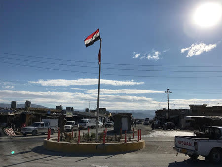 The Iraqi flag is seen in the city of Sinjar, Iraq November 24, 2017. Picture taken November 24, 2017. REUTERS/Raya Jalabi