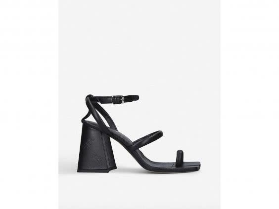 A simple black heeled pair of shoes will go with everything in your wardrobe (Selfridges)