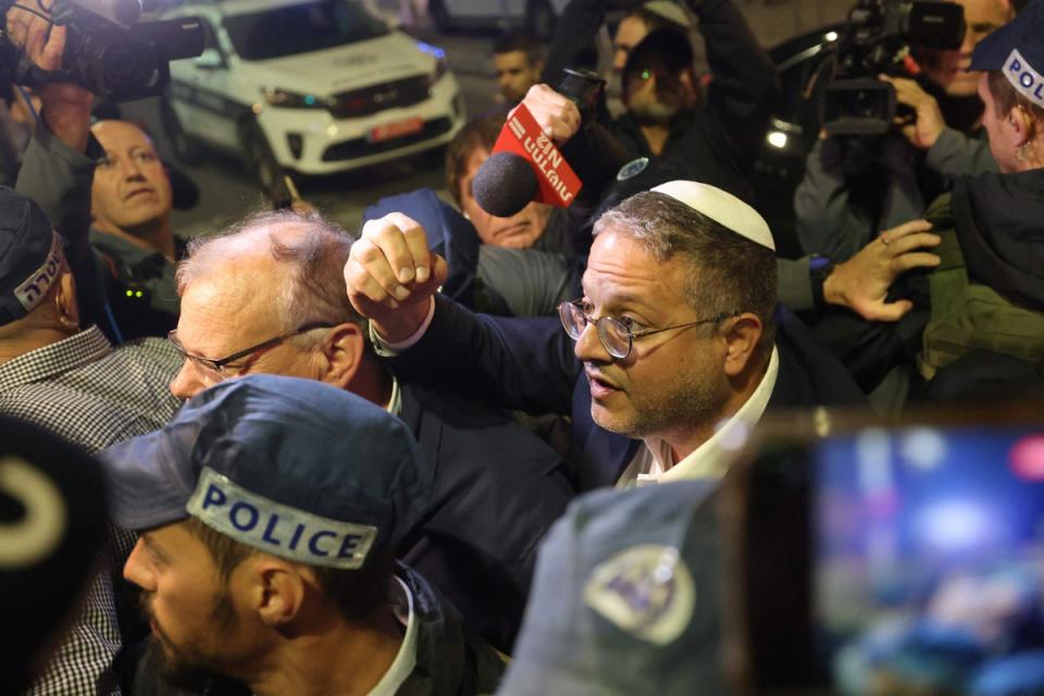 Israeli Minister of National Security Itamar Ben-Gvir speaks to bystanders (AFP via Getty Images)