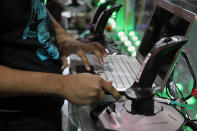 A robot driver switches on his control console. The match begins with a fifteen second autonomous period in which robots operate independently of driver inputs.