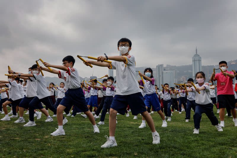 The Wider Image: Fifty years on, Bruce Lee's legacy squares up to modern life in Hong Kong