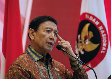 Indonesia Chief Security Minister Wiranto delivers a speech during a meeting between former militants and victims in Jakarta, Indonesia, February 28, 2018. REUTERS/Beawiharta