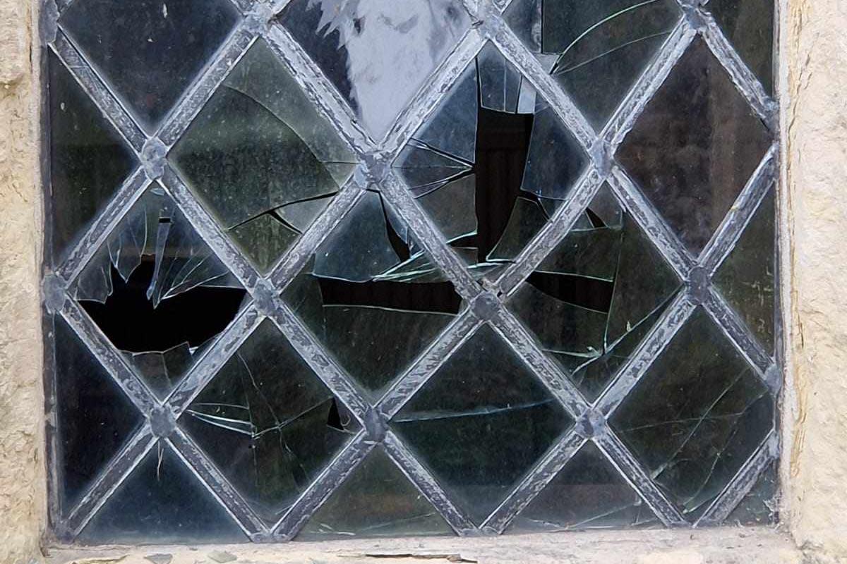 The smashed Victorian leaded glass window <i>(Image: Sue Bartlett)</i>