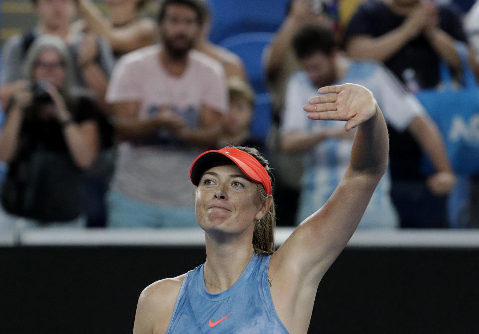 Russia's Maria Sharapova celebrates after defeating Sweden's Rebecca Peterson in their second round match at the Australian Open tennis championships in Melbourne, Australia, Thursday, Jan. 17, 2019. (AP Photo/Aaron Favila)